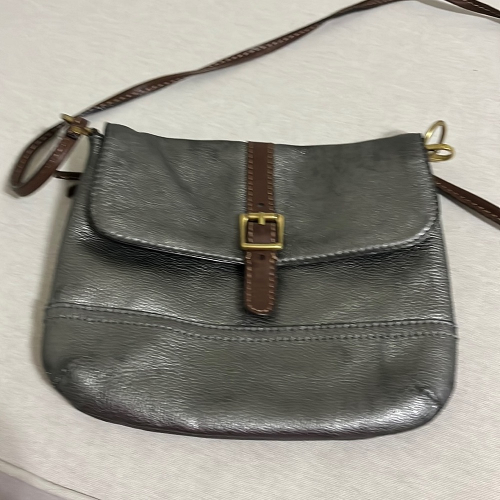 Metallic silver leather Fossil crossbody smaller size. GUC